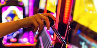 Mobile phone showing live roulette table with dealer and chat interface